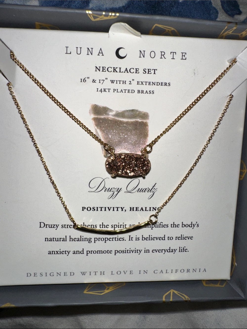 Luna Norte 14kt gold-plated brass layered necklace set features a sparkling